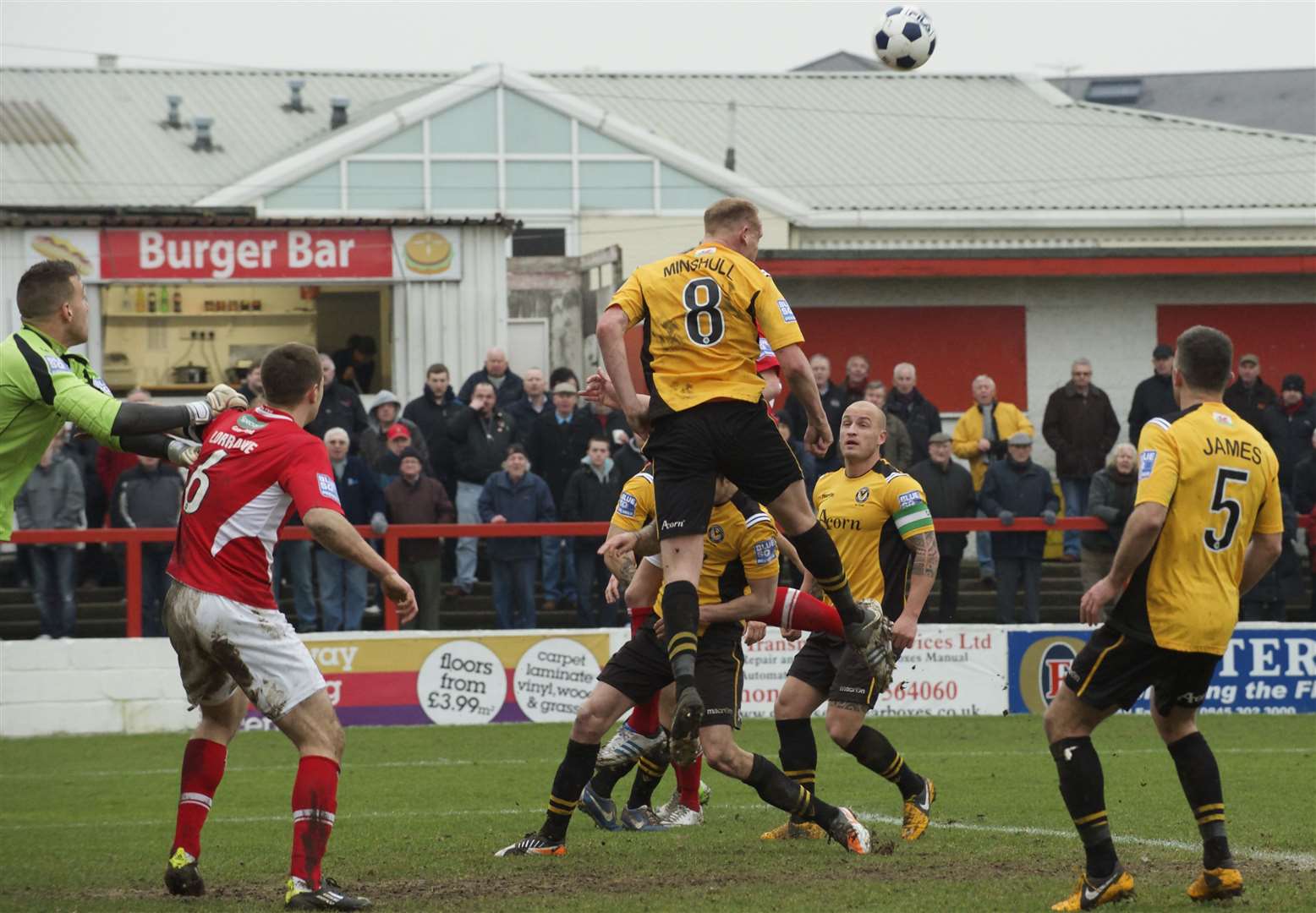 Lee Minshull (No.8) helped Newport reach the Football League after leaving AFC Wimbledon. Picture: Andy Payton
