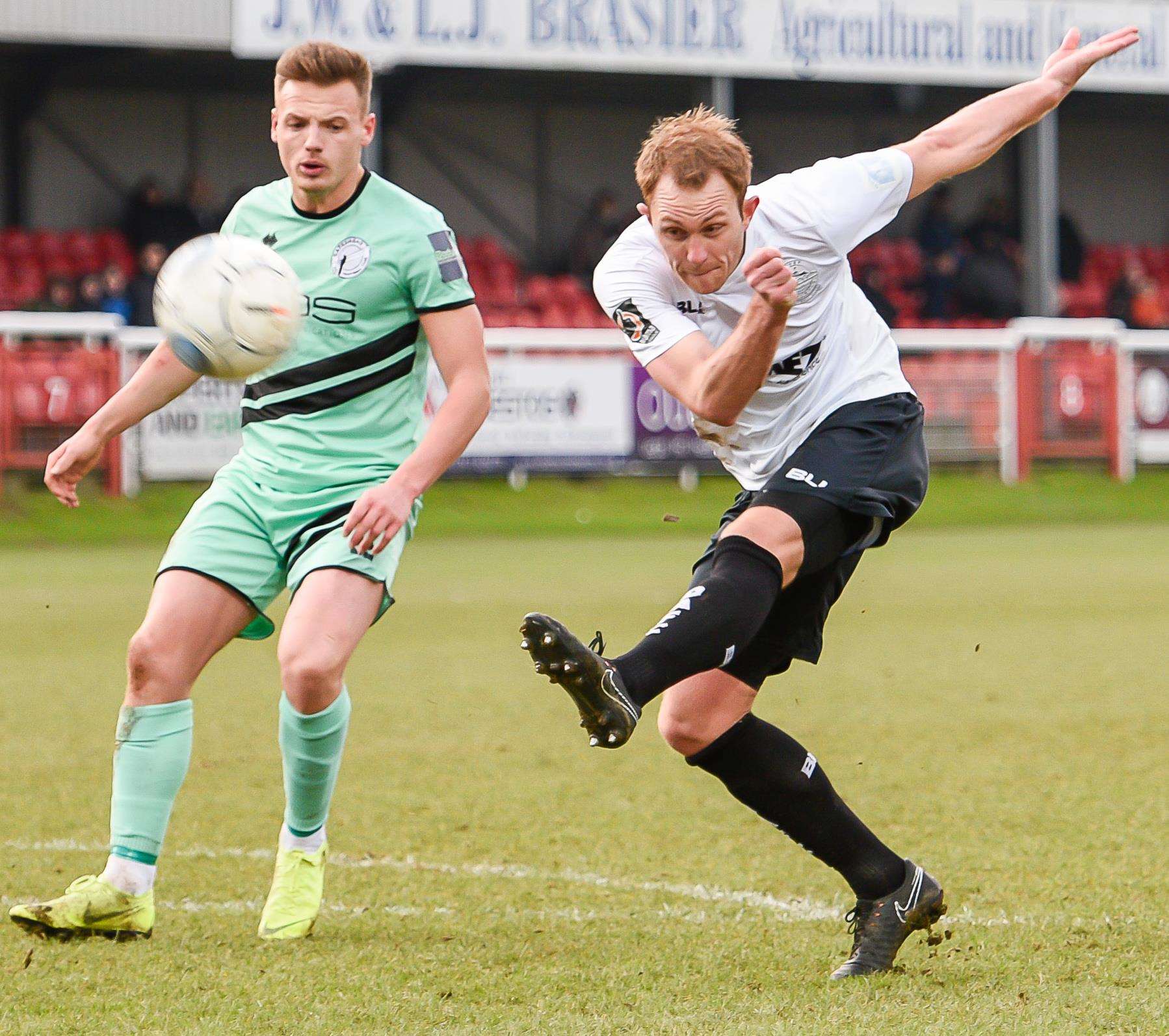 Dover's Stuart Lewis gets a shot away against Gateshead Picture: Alan Langley