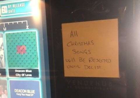 Keeping Christmas special, or at least restricting it to the month of December, there’s a note on the jukebox warning festive tunes will be monitored