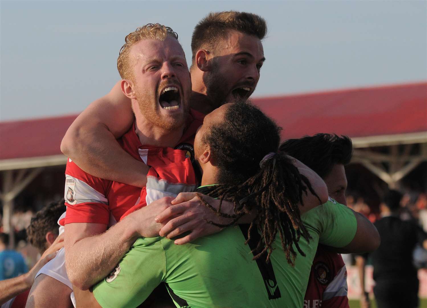 Kenny Clark celebrates with Nathan Ashmore and Matt Godden as Ebbsfleet reach the 2016 play-off final on penalties Picture: Ruth Cuerden