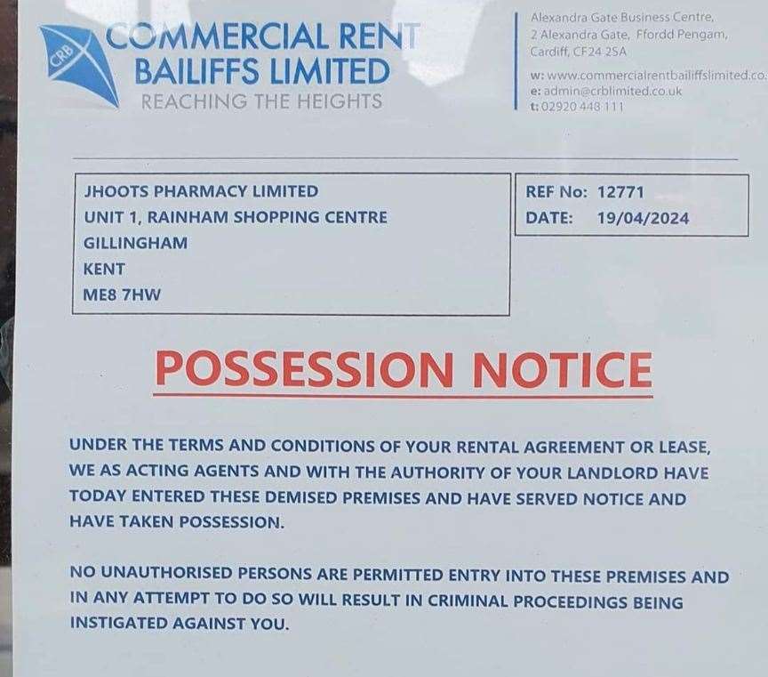 The possession notice in the window