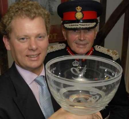 PROUD MOMENT: Jonathan Neame receives the award from the Lord Lieutenant of Kent, Allan Willett