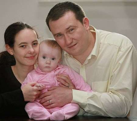 Cindy Buckle with husband Colin and their daughter Ella. Picture: www.worldwidefeatures.com