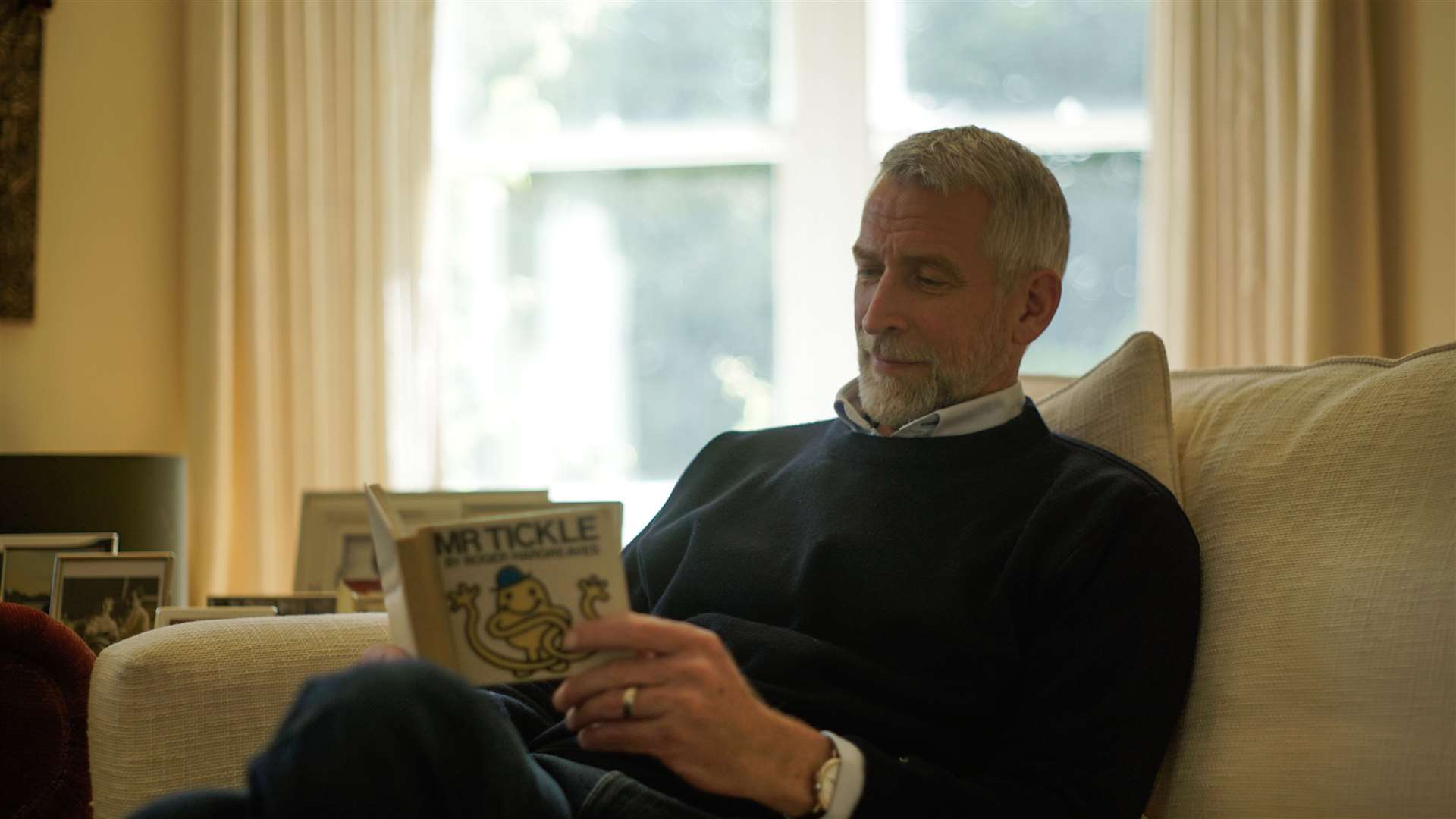 Adam Hargreaves reading the original Mr Tickle book. Picture: Sanrio