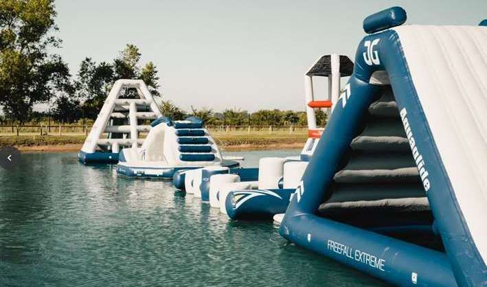 As well as a wakeboarding lake, the aqua park has a series of inflatable obstacles. Picture: Ryan Peacock