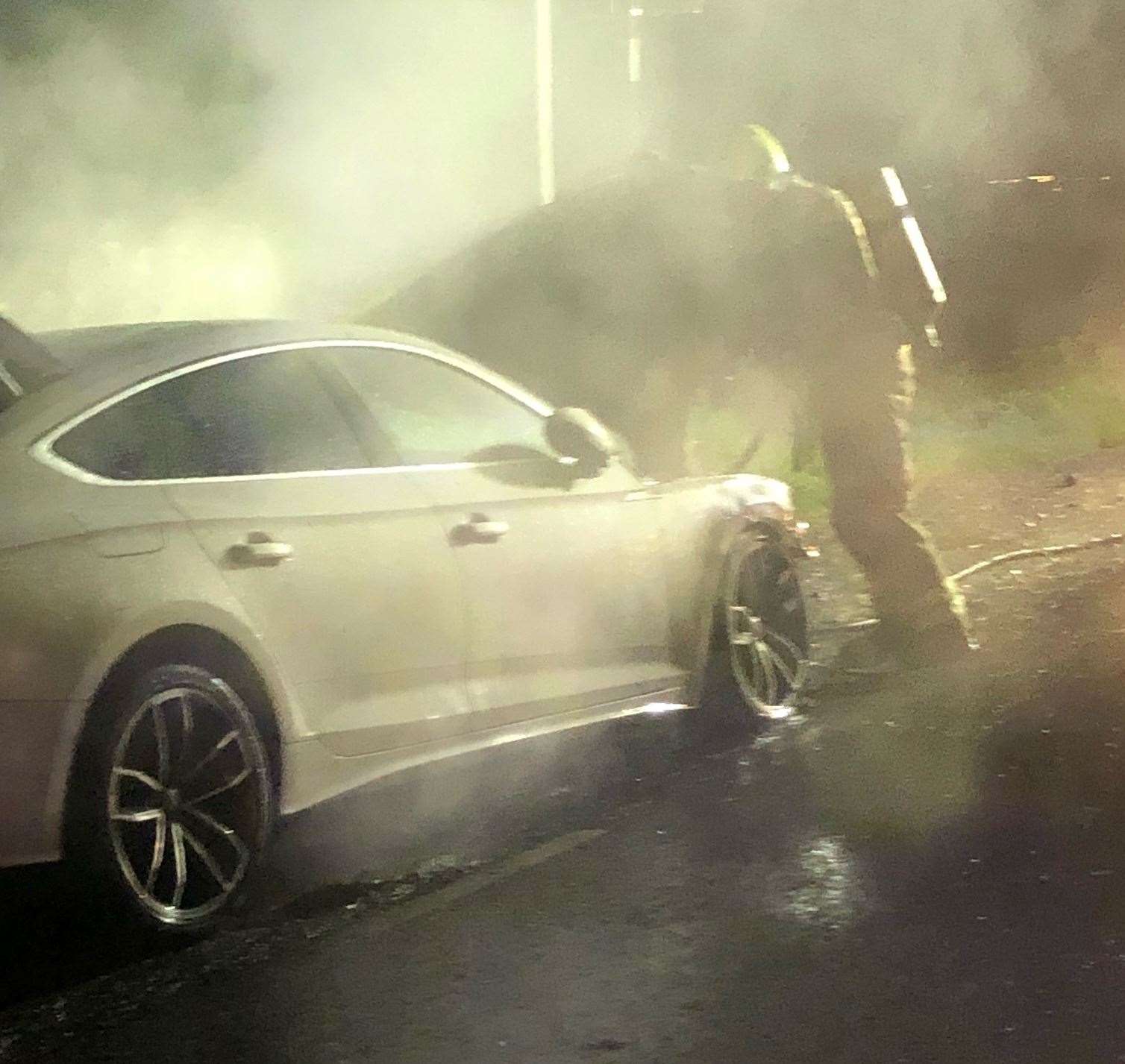 Firefighters put out the blaze when Leon's Audi A5 caught fire