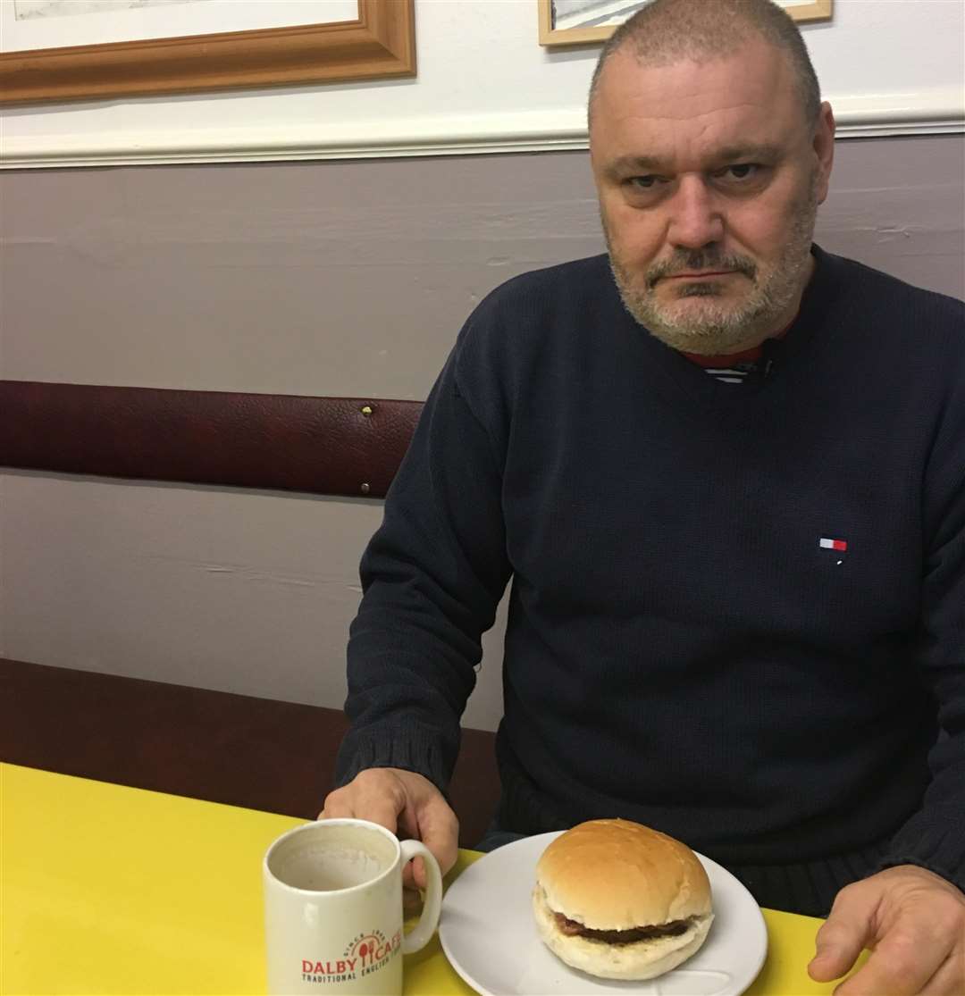 Dean Stalham, who runs The Stretch Outsider Arts Gallery in Margate, was fined for spitting but says he was coughing on a piece of bacon which he caught on his sleeve