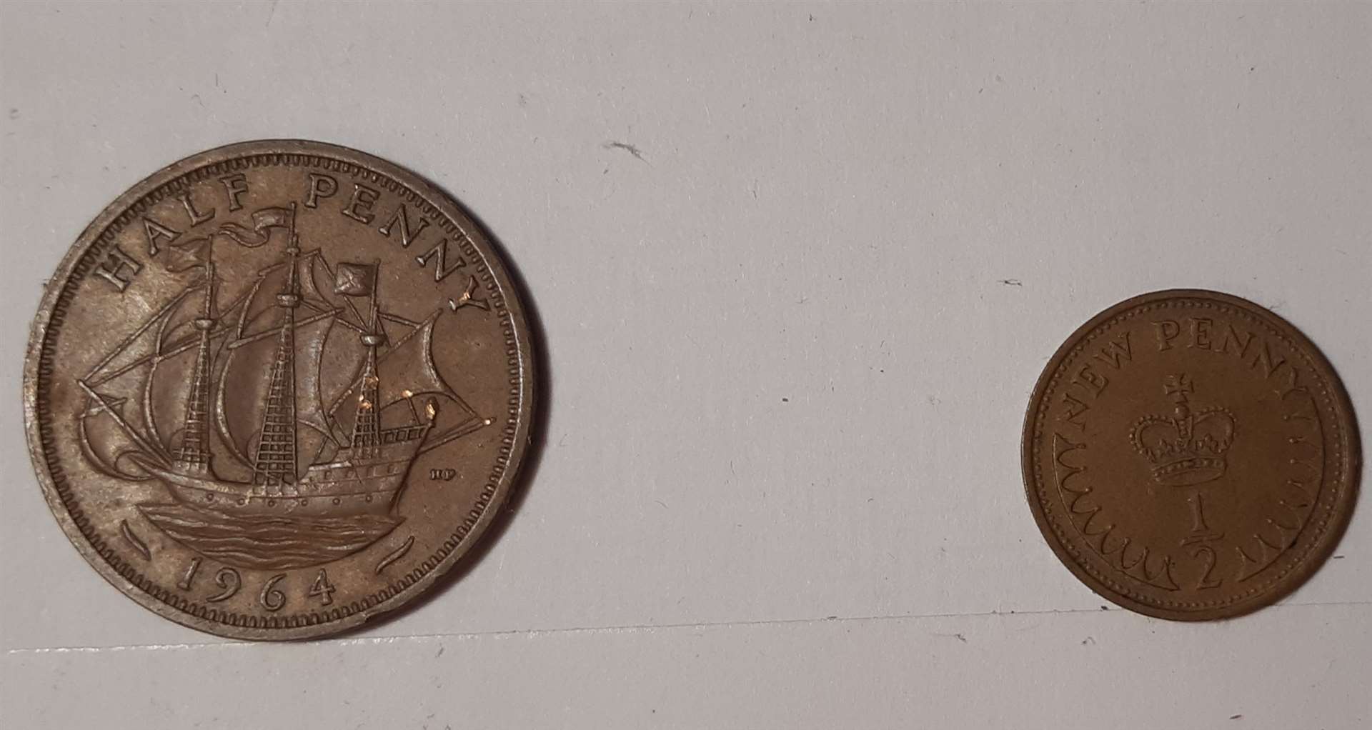The old and new ha'pennies