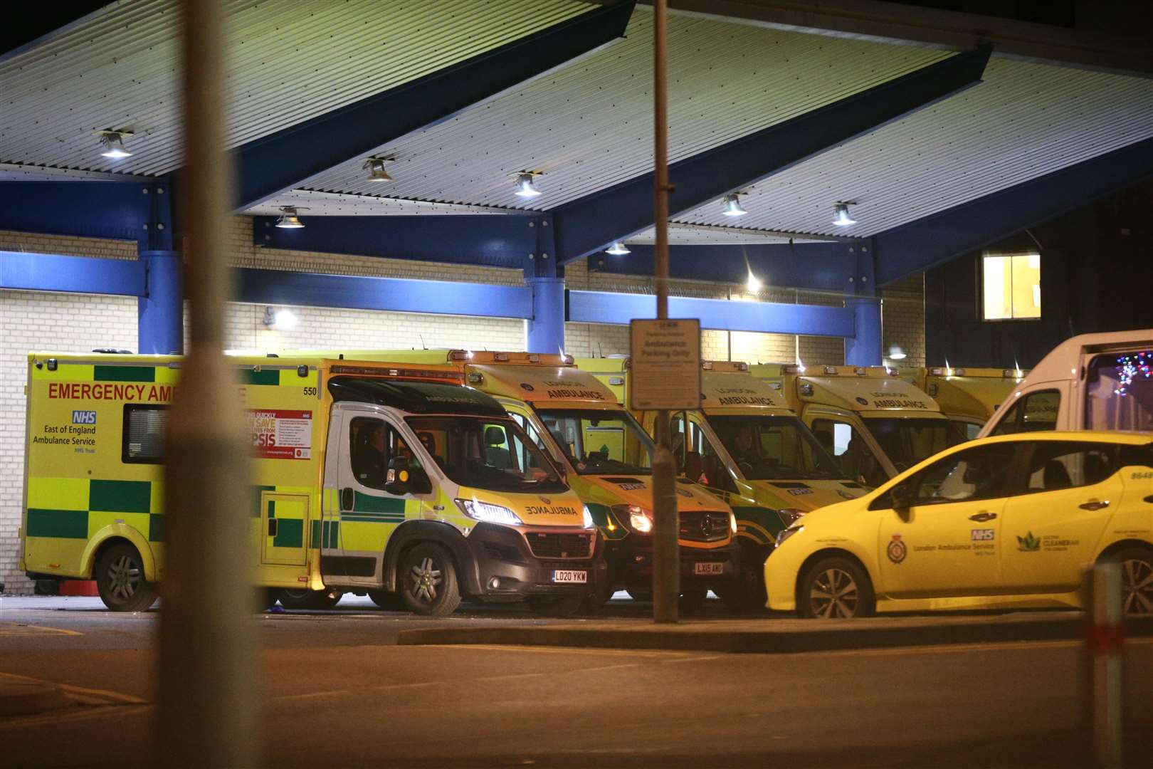 Ambulances outside Queen’s Hospital in Romford (PA)