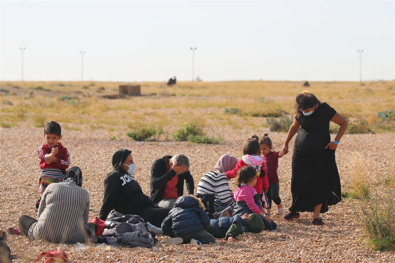 Asylum seekers landing at Dungeness last year, including children. Picture: Susan Pilcher