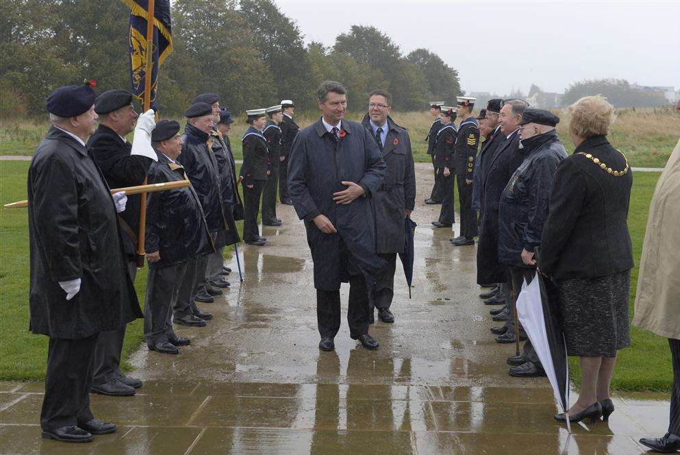 Sir Timothy Laurence, centre, Royal Naval Commissioner for the Commonwealth War Graves Commission, arrives at the Memorial