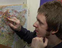Big cat enthusiast Neil Arnold studies a map of big cat sightings in Kent. Picture: MATTHEW WALKER