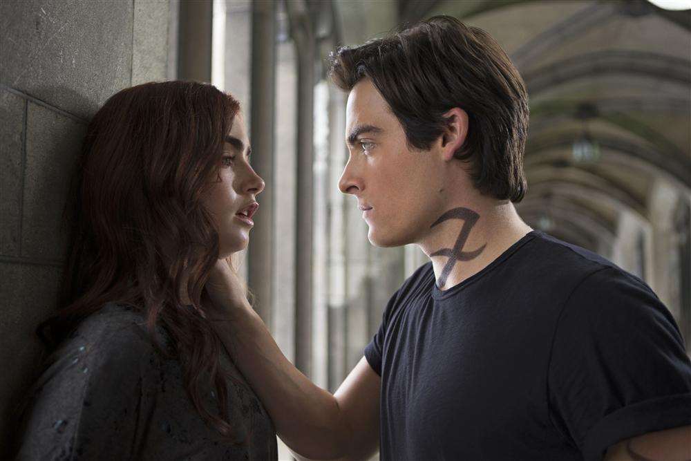 The first Mortal Instruments franchise film City Of Bones starring Lily Colllns as Clary and Kevin Zegers as Alec, bombed. Picture: PA Photo/Entertainment One.