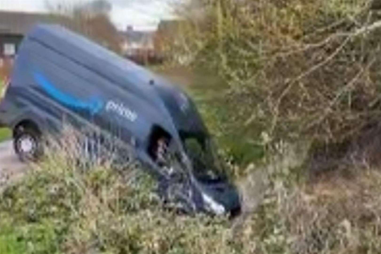 The delivery van is stuck in a ditch in Ashford. Picture: James Hazeldon