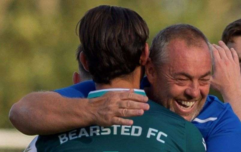 Bearsted boss Kevin Stevens celebrating with keeper Frankie Leonard. Picture: Ian Scammell