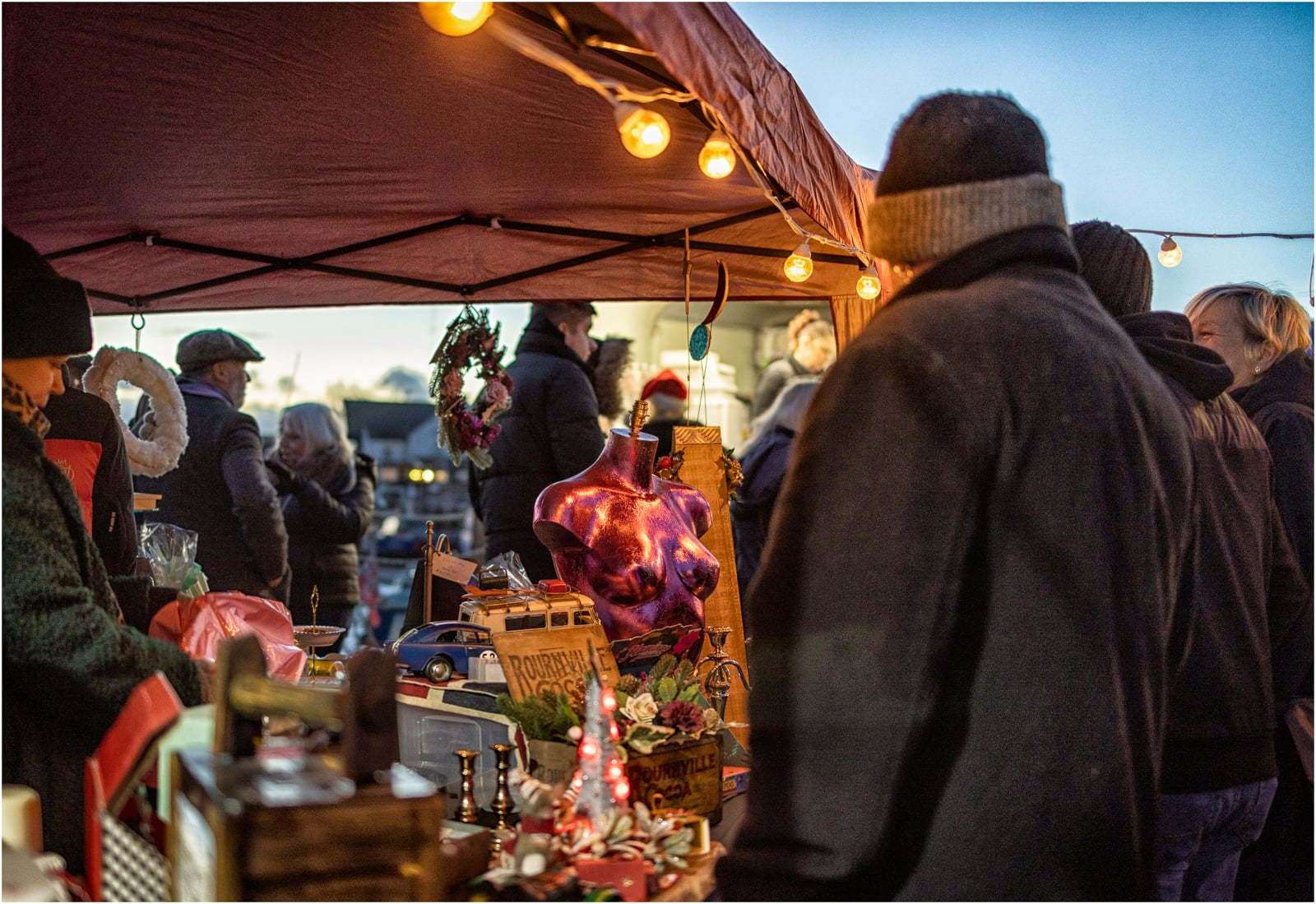 Festive shoppers packed the craft market on the quayside before the start of the Queenborough Lantern Parade on Sunday. Picture: Henry Slack