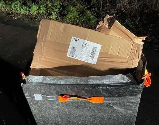 A bag of opened parcels left in Bon Fleur Lane near Coxheath