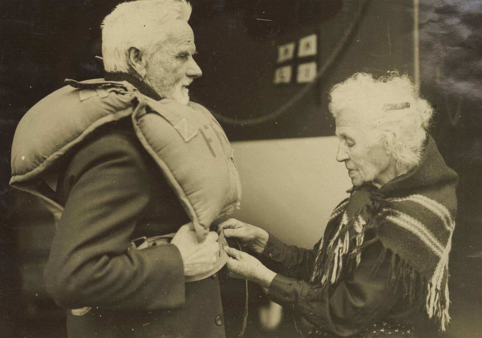 Coxswain William Brown gets his lifejacket fastened during 50-years of service on Cresswell Lifeboat from 1875, where by the age of 70 he’d rescued nearly 100 people - earning him a Certificate of Service on retirement and his wife a gold brooch for her services as a launcher and fundraiser. Image: RNLI.