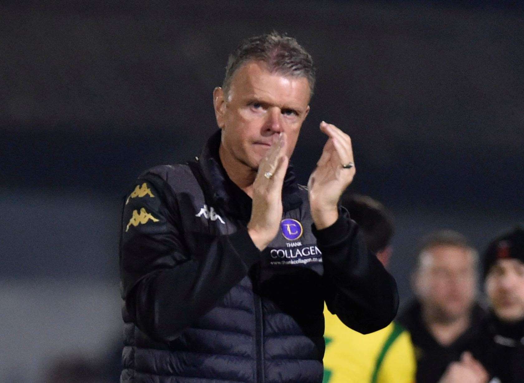 Dejected Faversham boss Tommy Warrilow applauds the fans after again suffering play-off heartache as they lost 4-1 on penalties on Tuesday night after a 2-2 draw. Picture: Ian Scammell