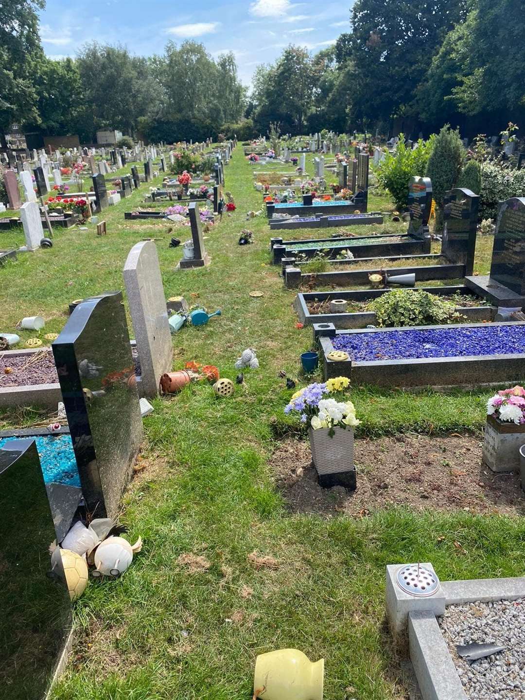 Police arrested a woman after graves were vandalised in Swanscombe on Thursday. Picture: Emma Ben Moussa