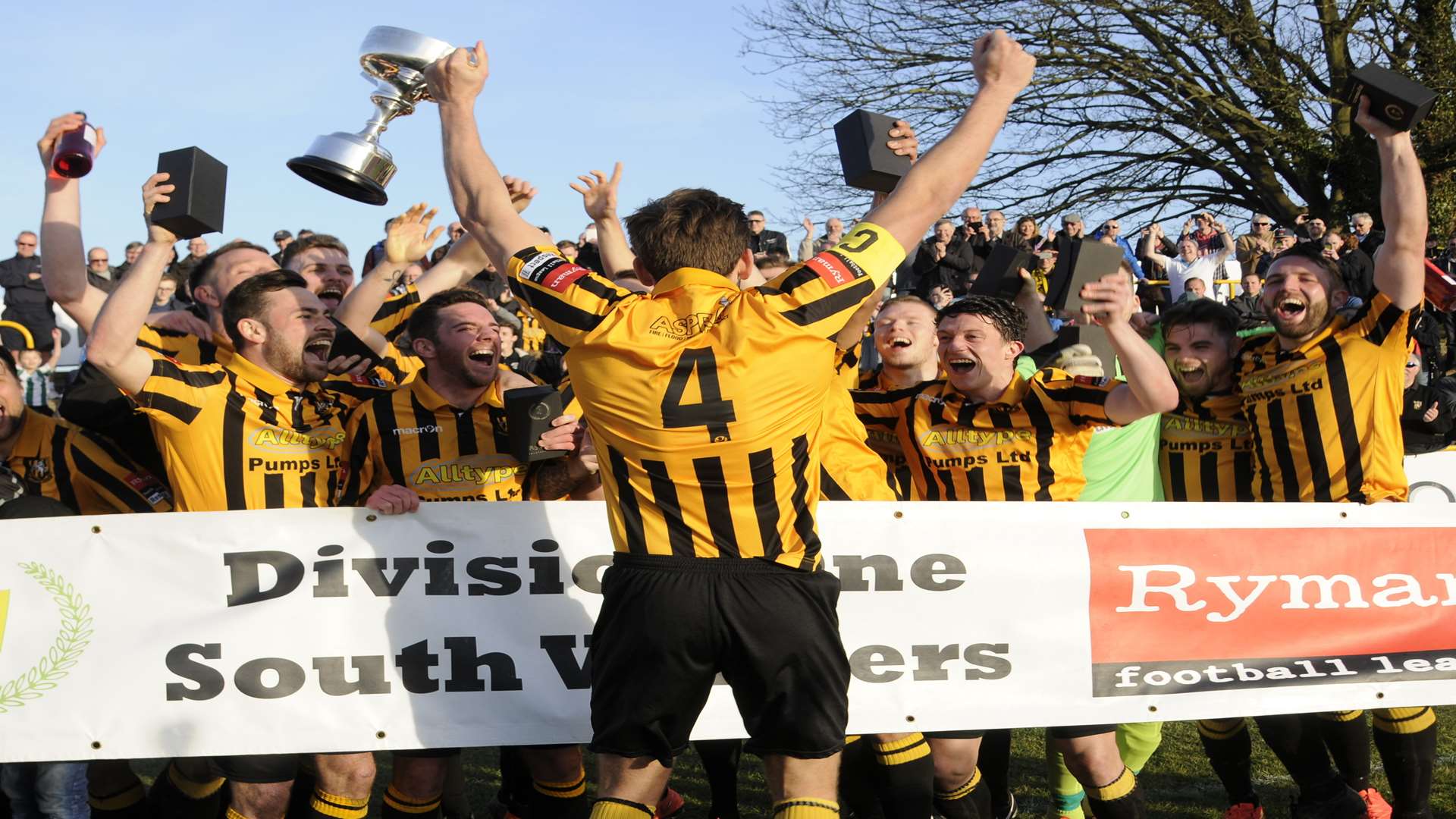 Folkestone captain Liam Friend celebrates promotion with his team-mates Picture: Gary Browne