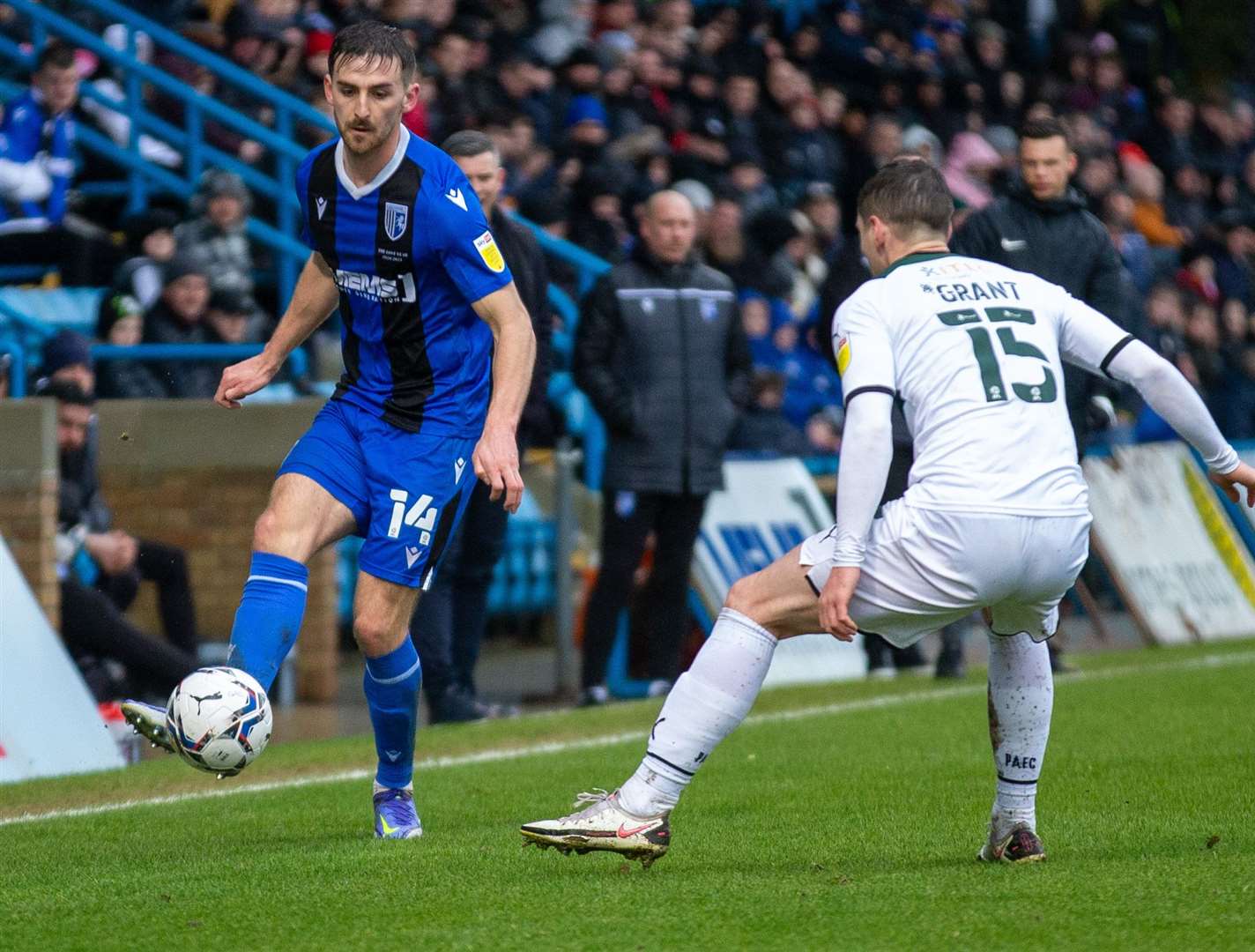 Gillingham's Robbie McKenzie takes on Plymouth's Conor Grant during his team's loss to Argyle. Picture: KPI