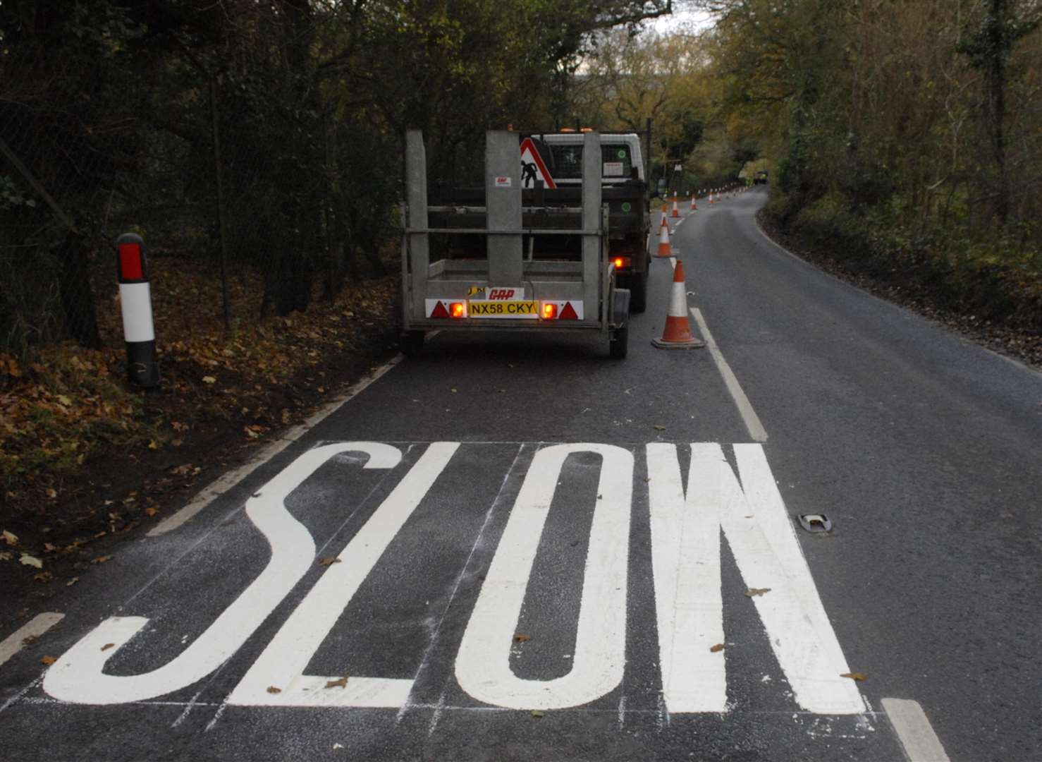 Slow road marking. Stock image