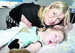 Ralph Mattison-Evans, 17 months, who has incurable nemaline myopathy with his mother, Sarah Mattison.