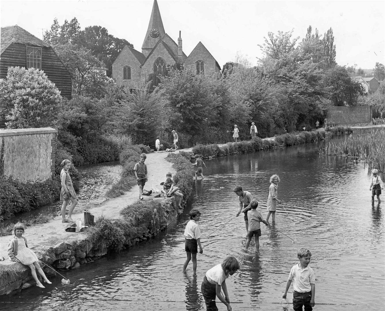 Youngsters having fun in Loose Stream, Maidstone, in 1965