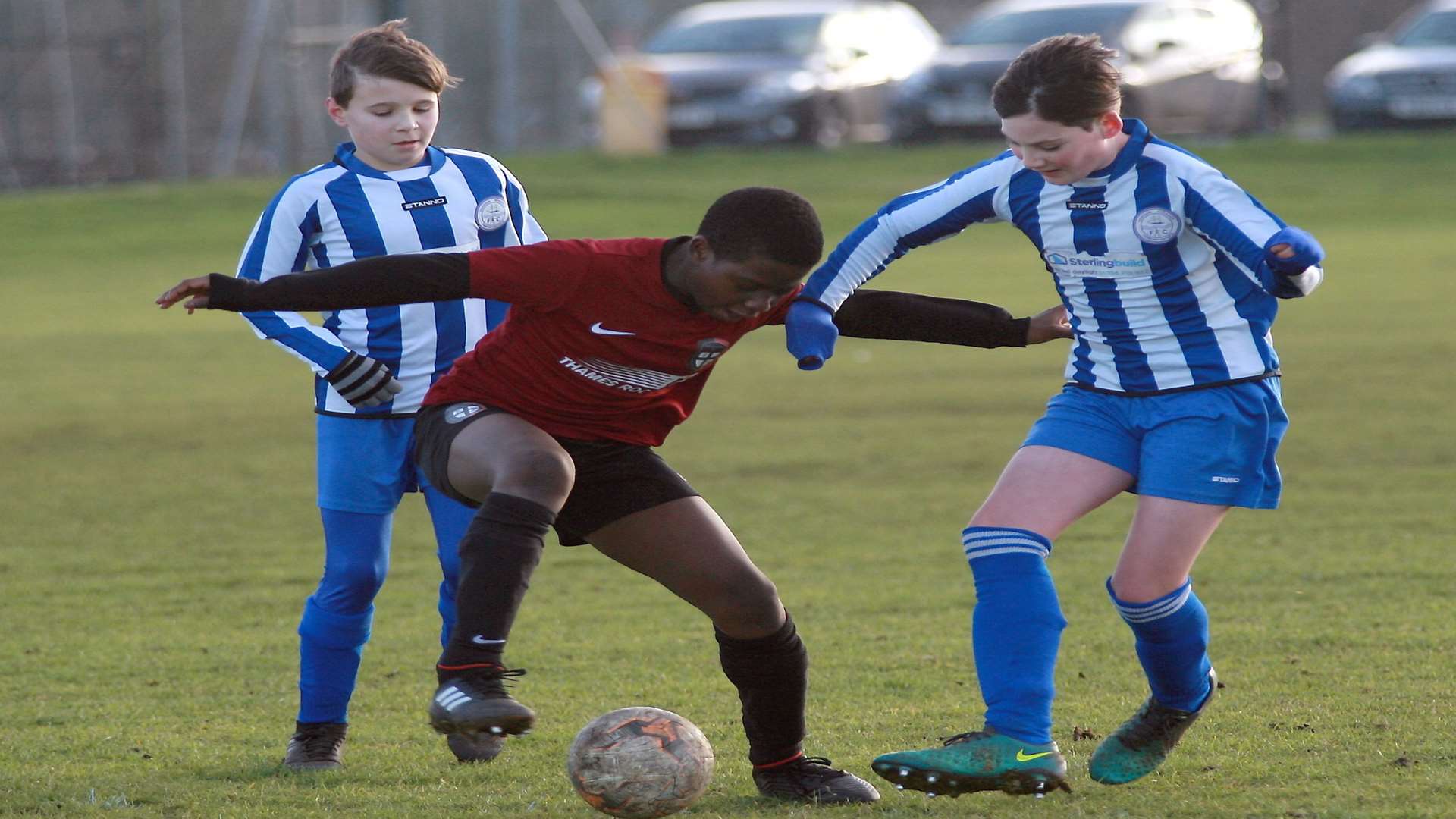 Action from the under-12 League Cup clash between Strood United and Chatham Riverside Picture: Phil Lee