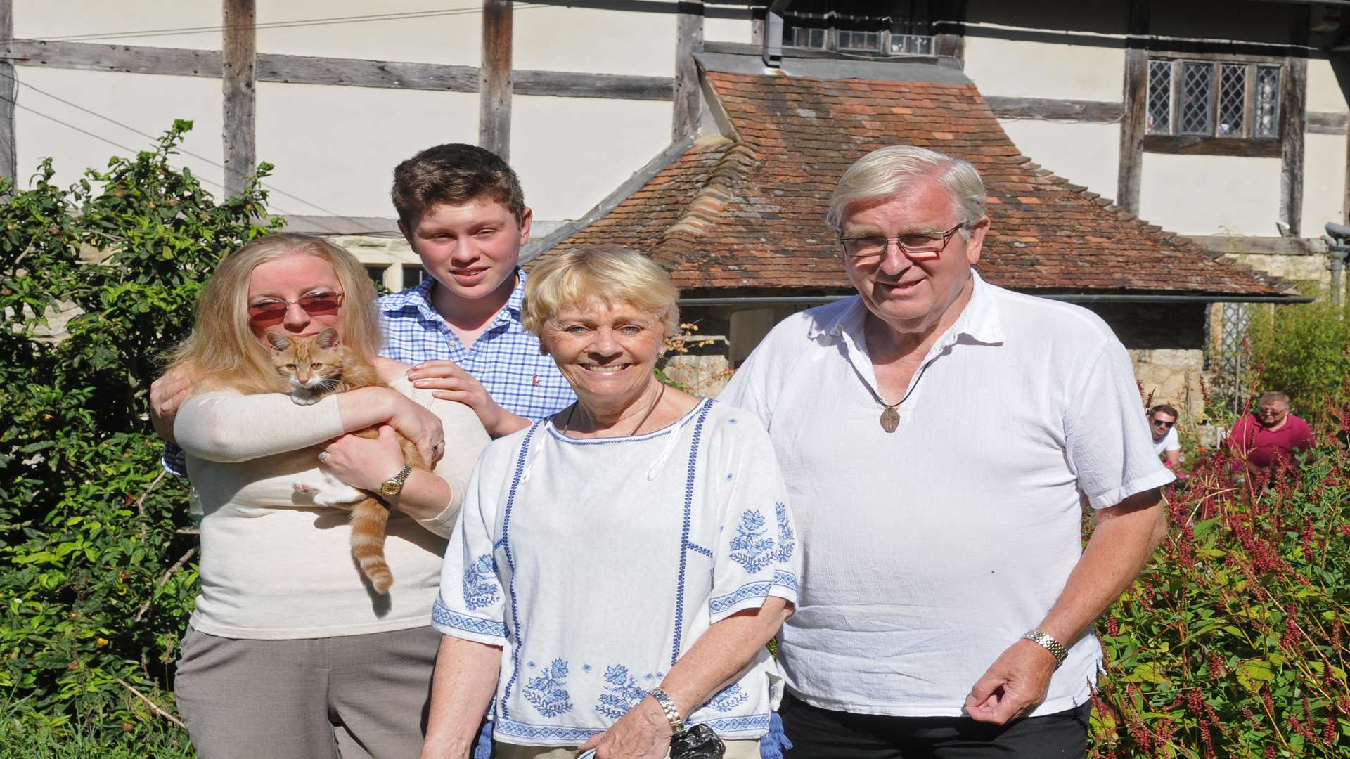 Karen, Louis, Avril and Alex with kitten Gizzy, pictured at an Open Gardens event in aid of the Heart of Kent Hospice earlier in the year. Picture: Wayne McCabe