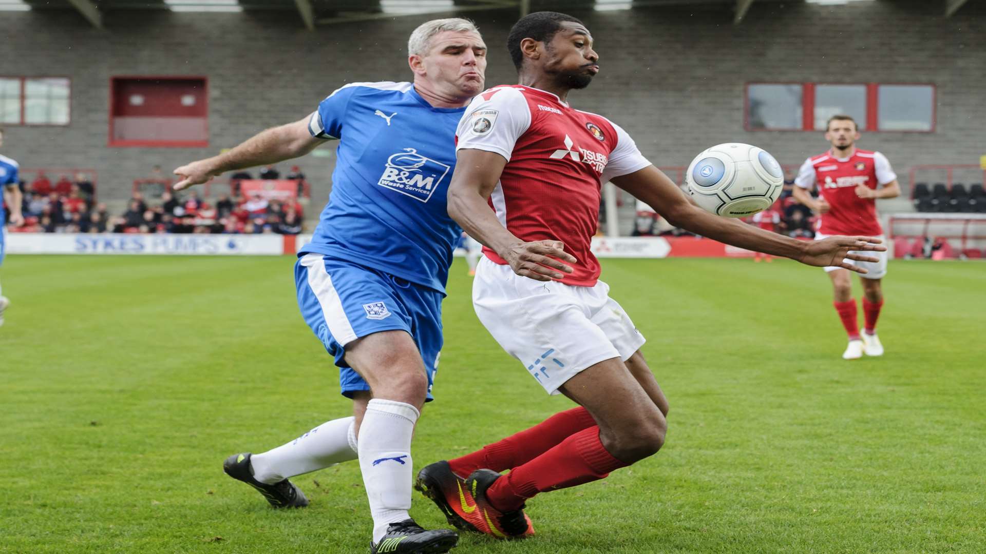 Danny Mills up against Tranmere defender Steve McNulty Picture: Andy Payton