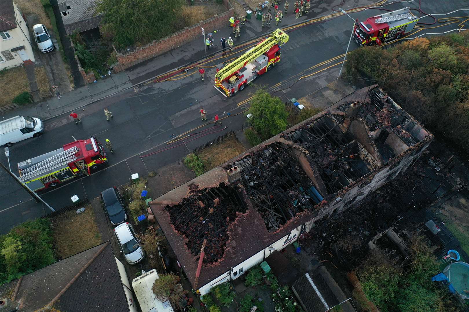 A huge fire swept through four homes in Crayford Way, Crayford after starting in grassland Photo: UKNIP