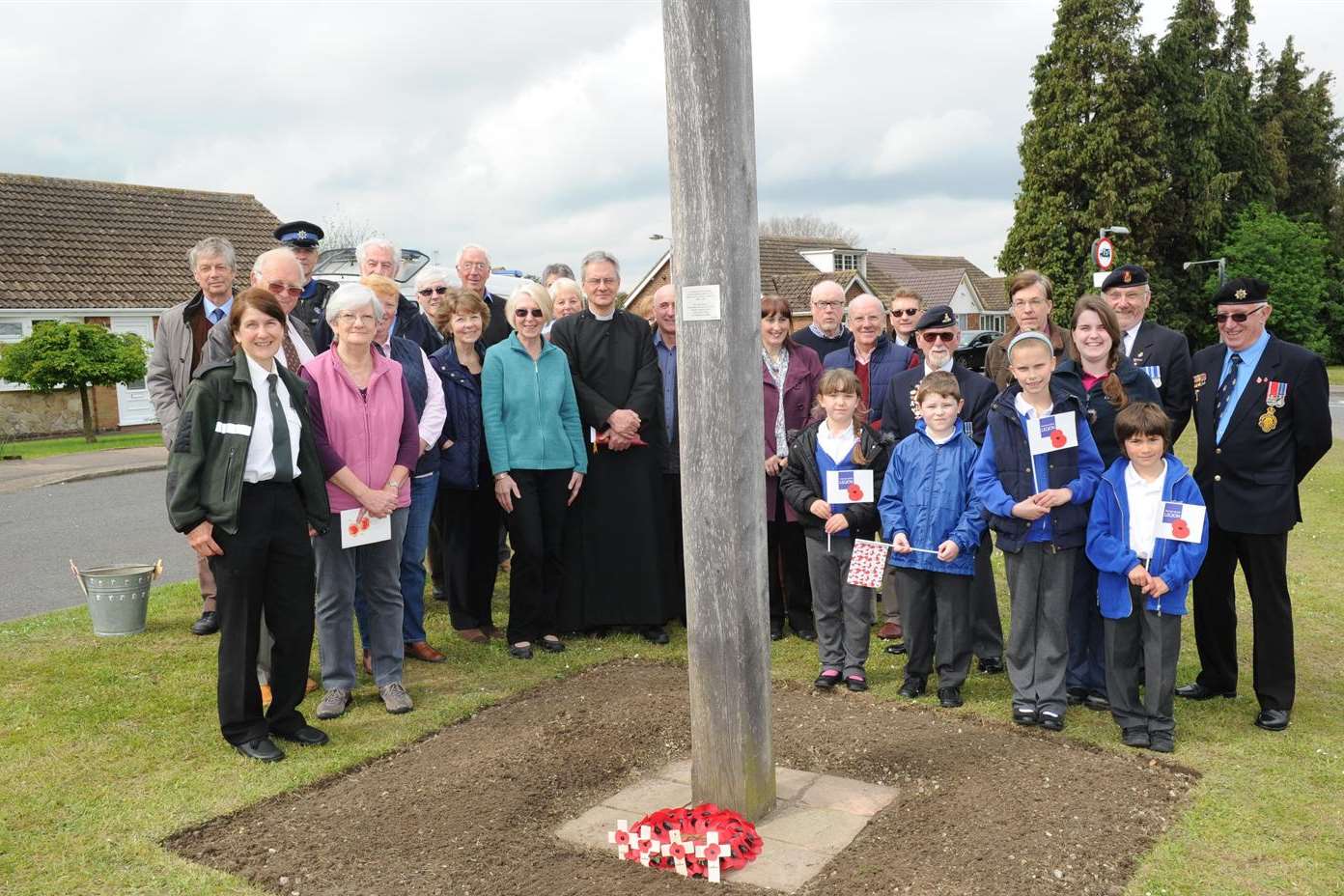 People gathered alongside the A2 to honour the village's fallen heroes back in April