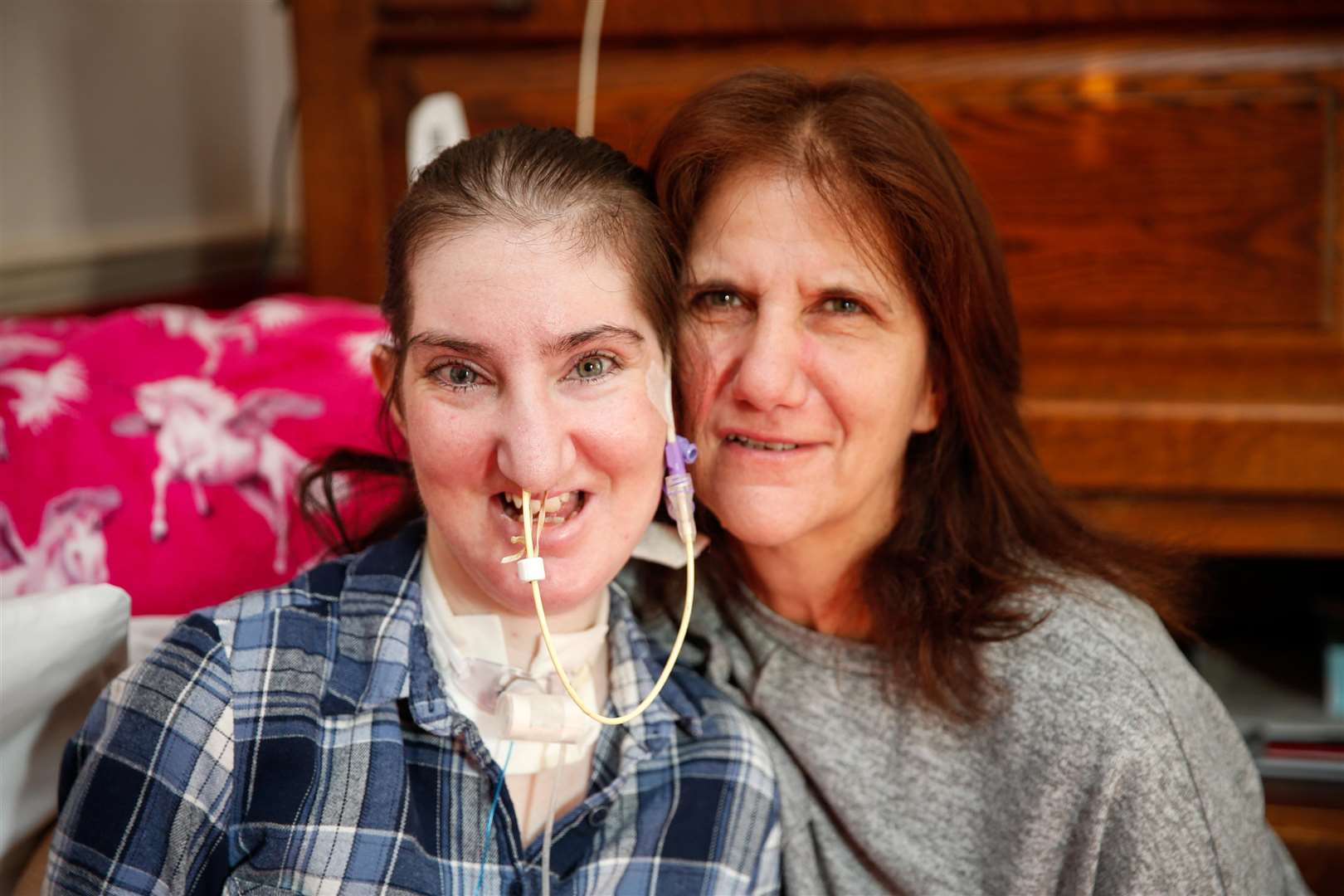 Chelsea Kirby who suffers from multiple conditions who's housing needs are not met in her current home in Snodland. Chelsea with mum Karen. Picture: Matthew Walker. (6682828)