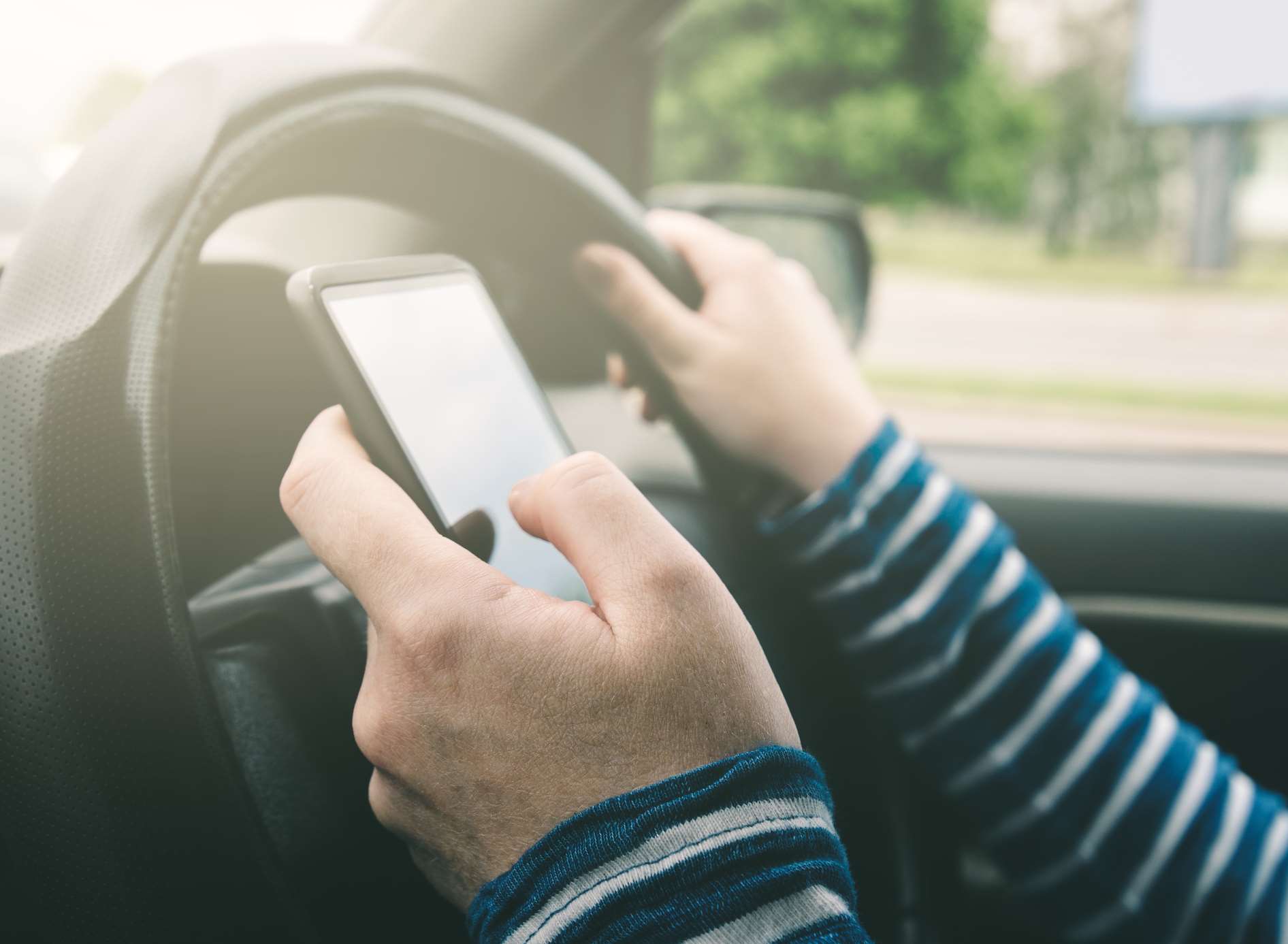 It's a criminal offence to use a mobile phone while driving