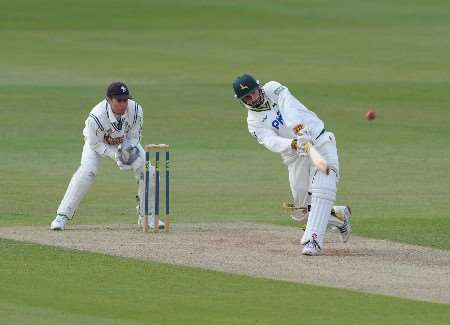 FORMER St Lawrence favourite Mark Ealham scores his first championship century since July 2006. Picture: Barry Goodwin