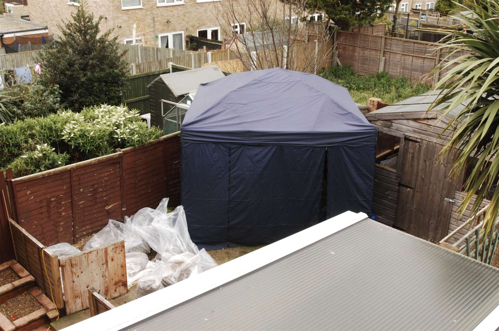 Police make a grisly discovery in the garden of a Margate home. Picture Dave Downey
