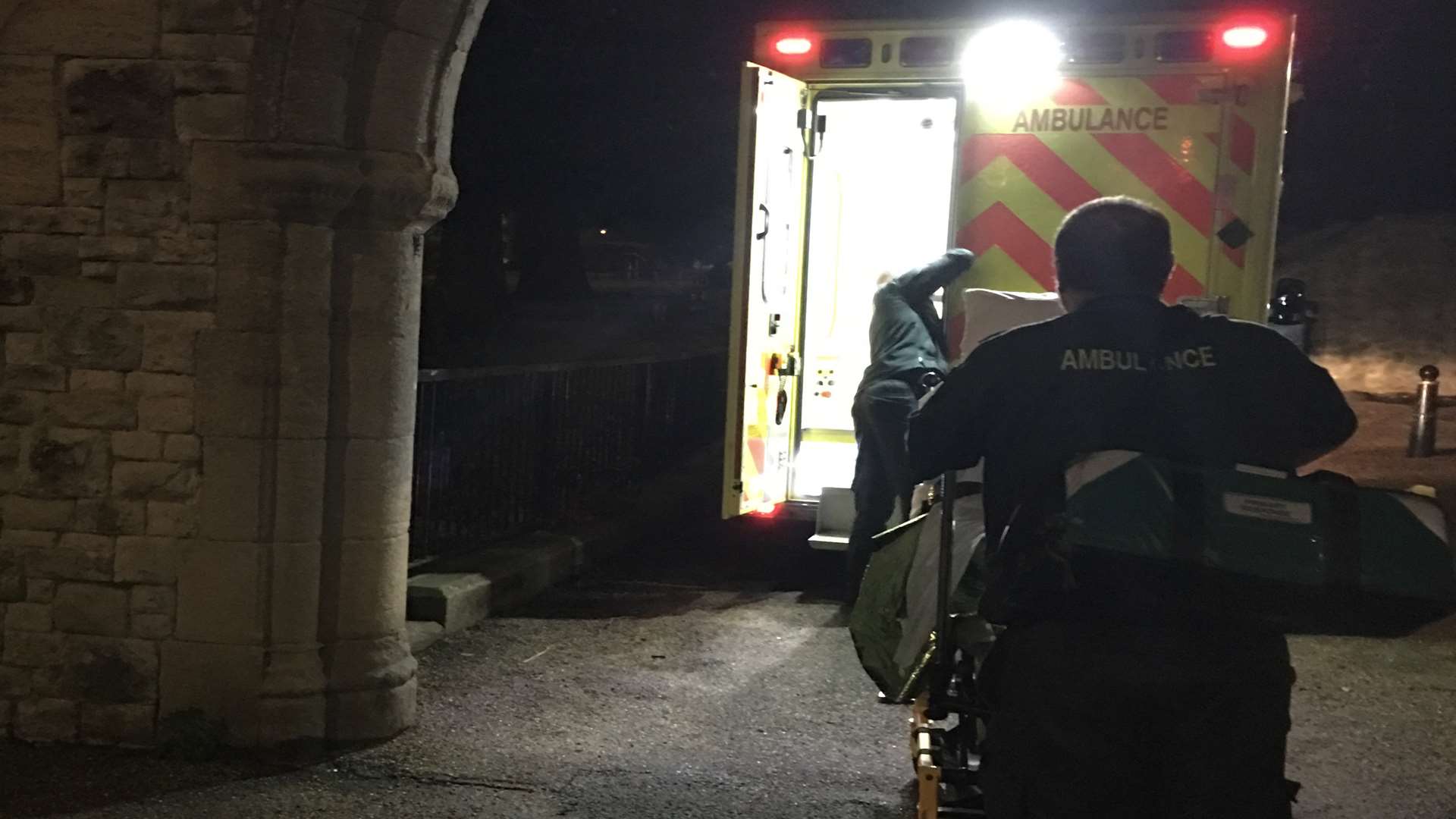The rescued woman is carried into an ambulance. Picture: Kent Search and Rescue