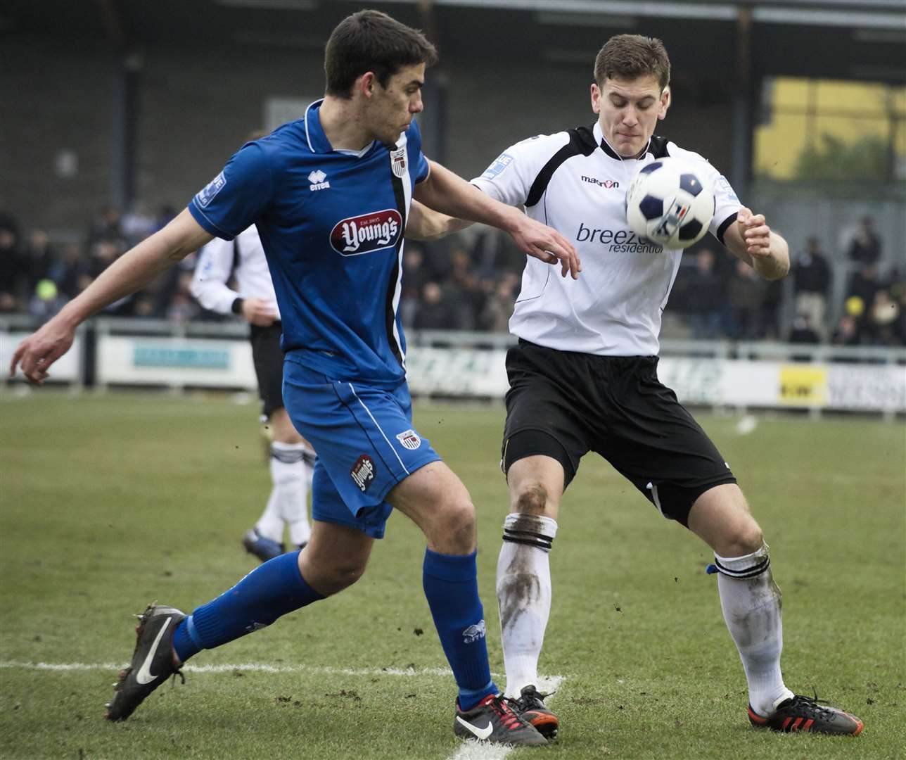 FA Trophy Semi-final second leg action as Grimsby’s Shaun Pearson faces Dartford’s Tom Bonner. Picture: Andy Payton