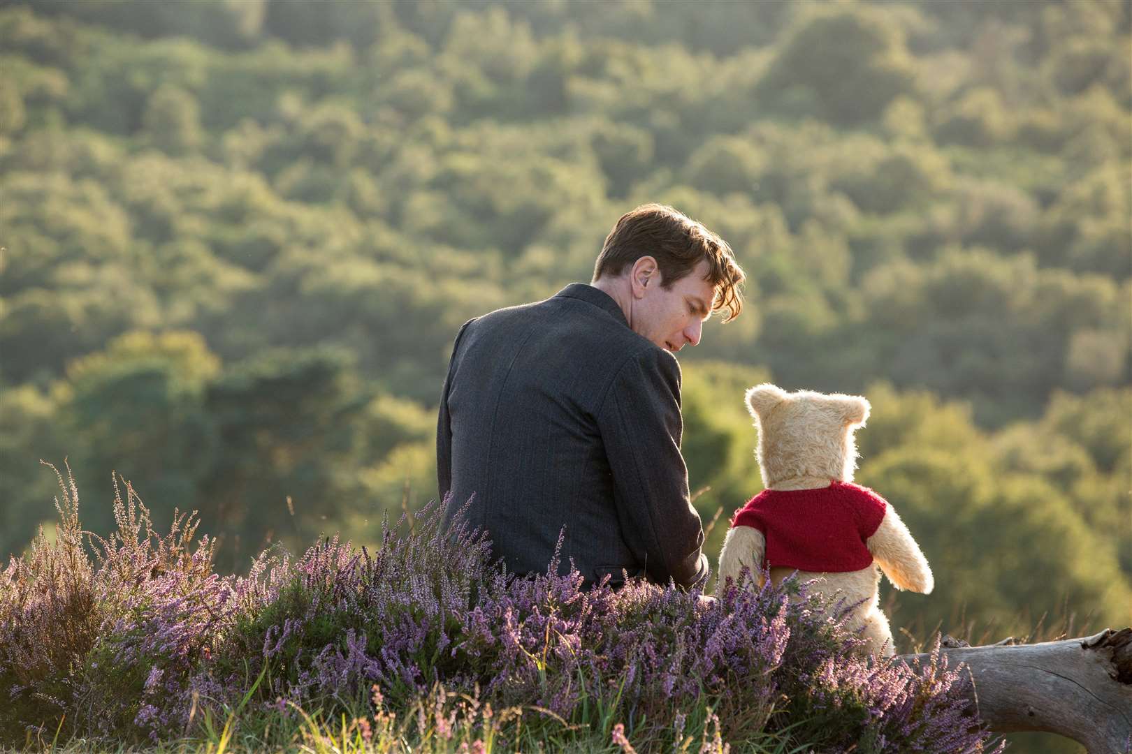 Christopher Robin. (Ewan McGregor) with his long time friend Winnie the Pooh in Disney’s live-action adventure Christopher Robin