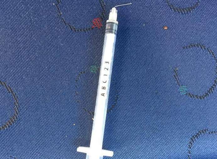 The used syringe which was tucked behind Steve Cross’s car door handle