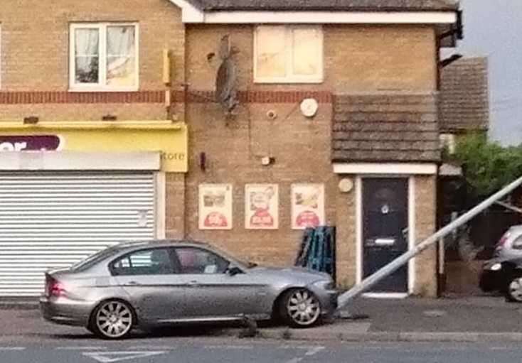A BMW crashed into a lamppost outside the Premier store in Queensway, Sheerness. Picture: Dan Gordon