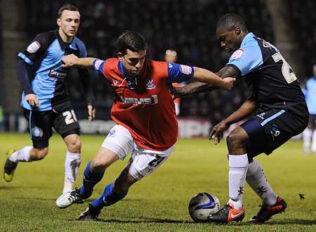 Cody McDonald looks for a way through against Wycombe