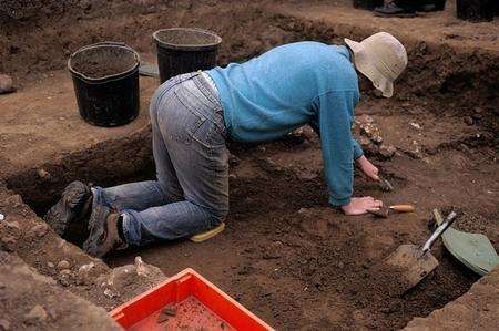Archaeologists working on the site. They have found Roman murder victim and some other items.