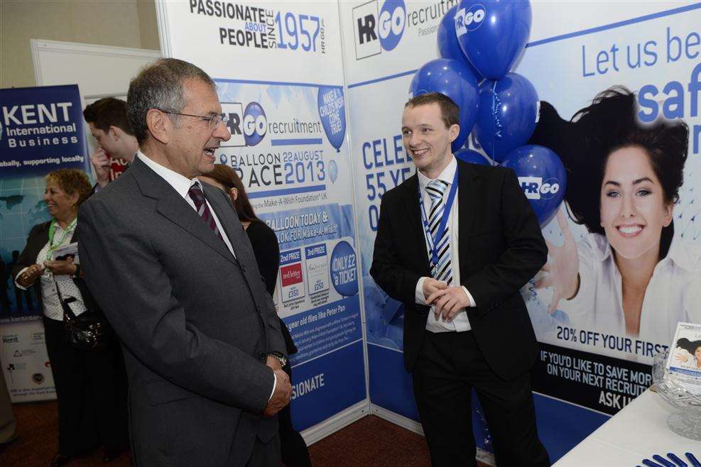 An HRGO Recruitment stand at Kent Invicta Expo at the Ashford International Hotel, visited here by businessman Gerald Ratner