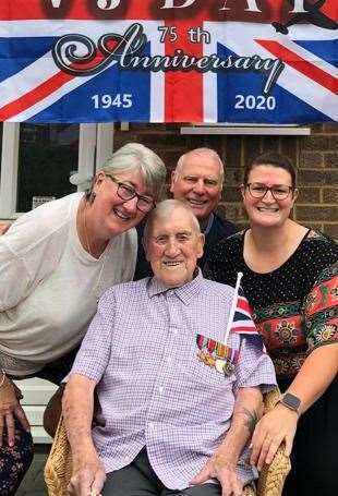 Leslie Burkett on the 75th anniversary of VJ Day in August 2020, with his daughter Irene, son-in-law Deryck and granddaughter Amie