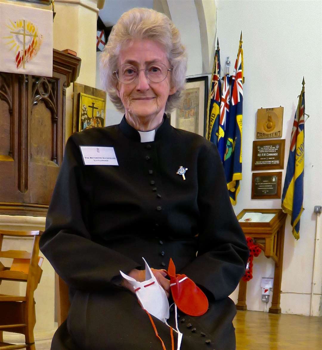 Revd Jacqueline Littlewood with the two purses she received. Picture: Christ Church Gravesend
