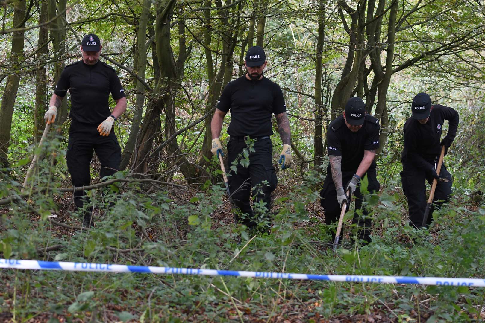 Police scour woods in Hartley. Picture: Steve Finn