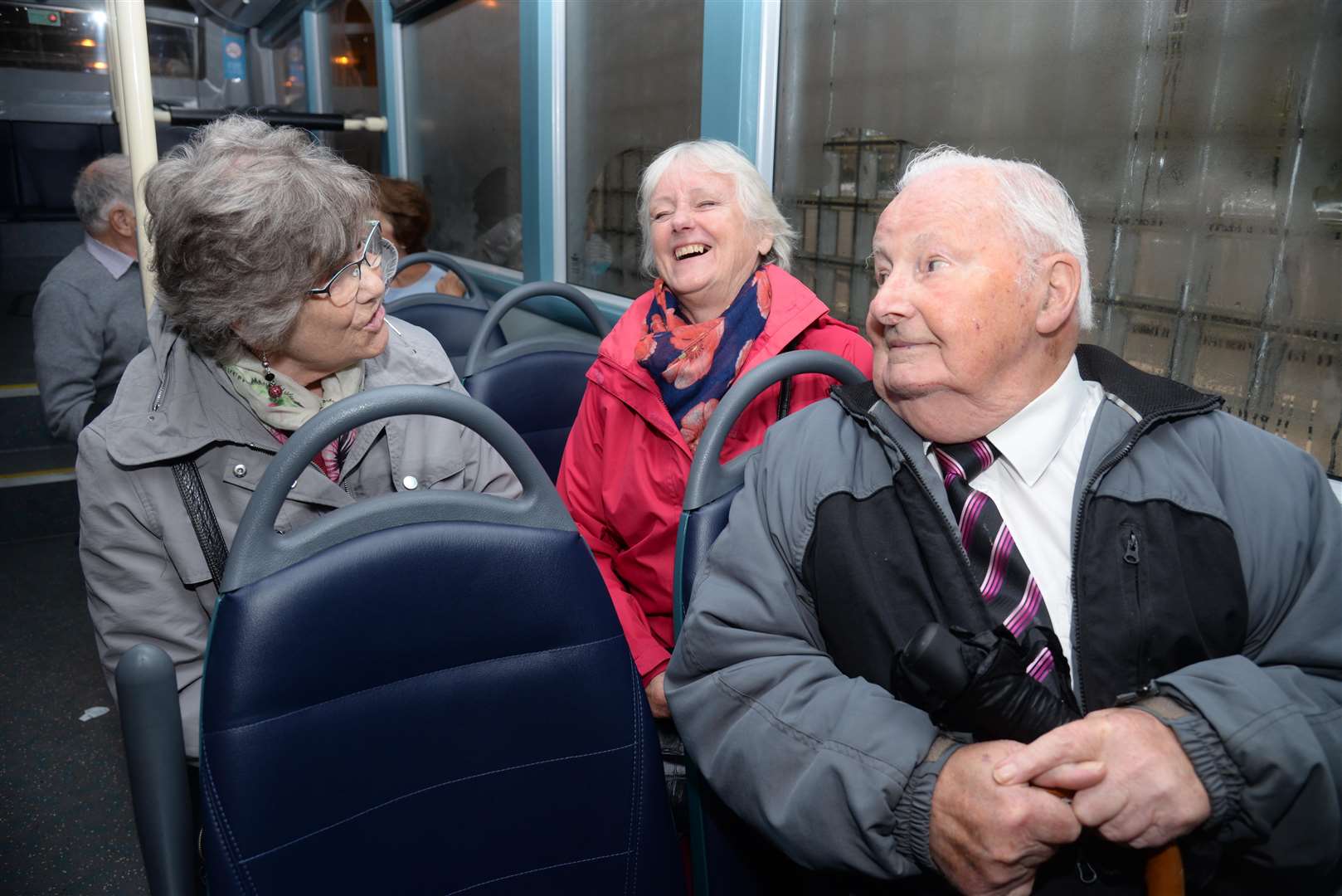 Diana Thomas, Lorraine Smith-Lowther and Michael Brown chat on-board the talking bus. Picture: Chris Davey